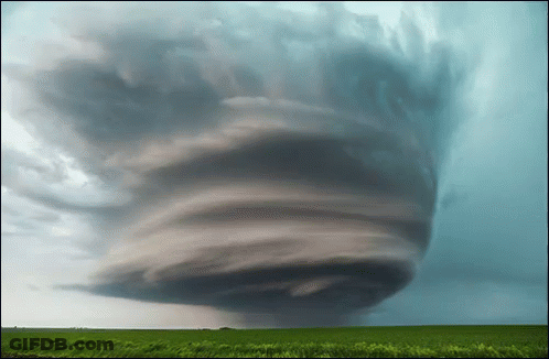 Large Tornado Moving Through Grass Field GIF