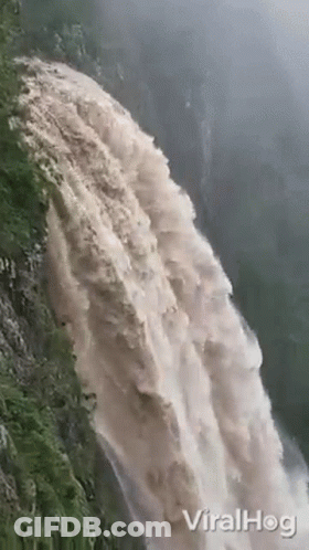 Large Waterfall Falling Down Cliff GIF