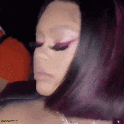 Latto Wiggly Hair With Red Eye Shadow GIF