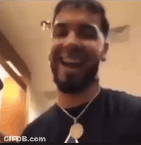 Laughing Bearded Man With Sunglasses And Necklace GIF