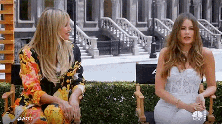 Laughing Heidi Klum GIF