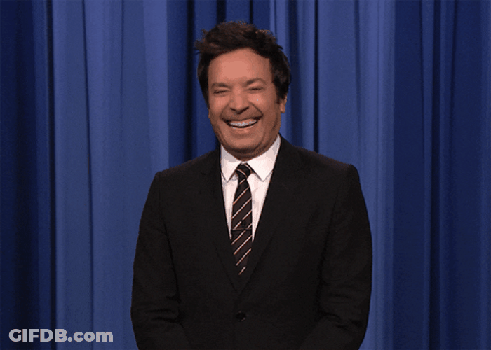 Laughing Jimmy Fallon Shrugs GIF