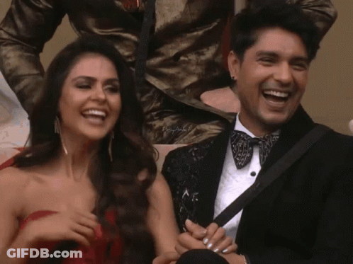 Laughing Man In Tuxedo And Woman In Red GIF