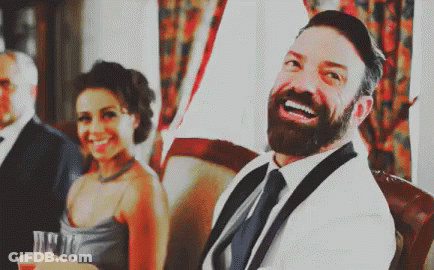 Laughing Man Sitting In Chair GIF