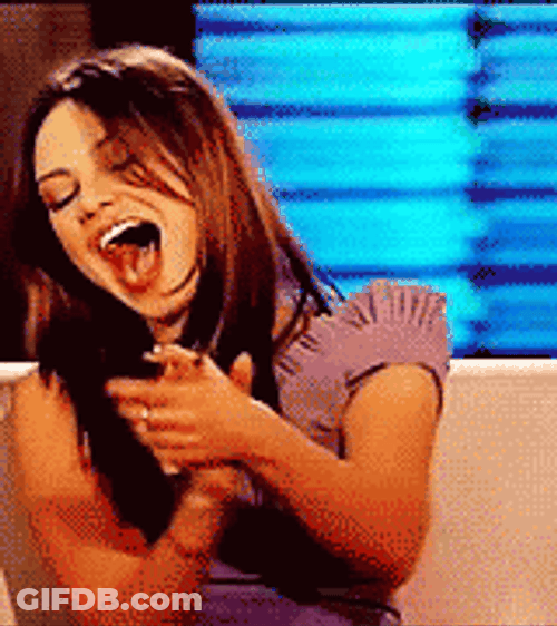Laughing Mila Kunis GIF