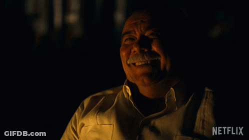 Laughing Mustache Man With Netflix Logo Behind GIF