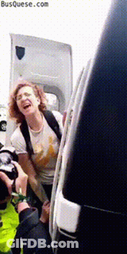 Laughing Woman Getting Out Of Van With Hood Open GIF