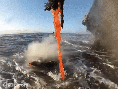 Lava Flowing From Rock In Ocean GIF