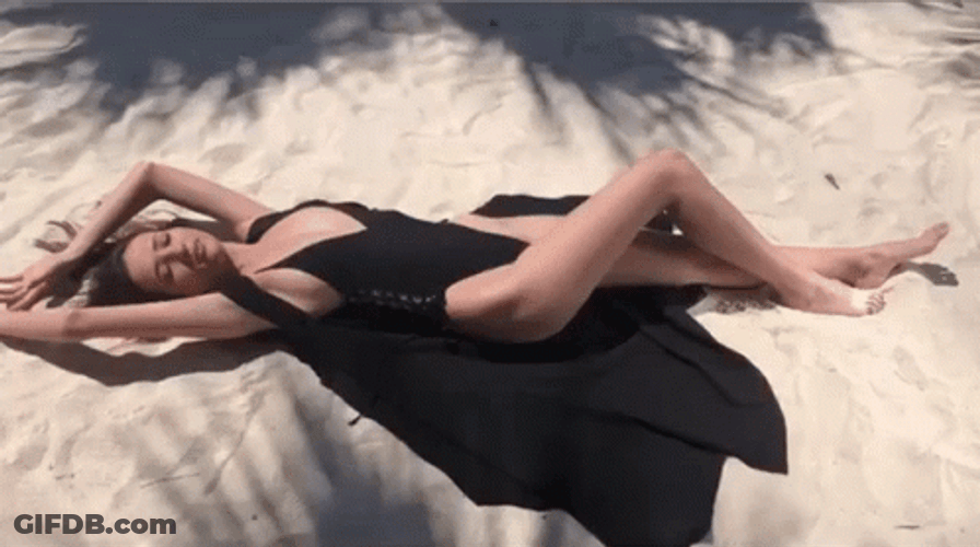 Lay Down On Sand GIF