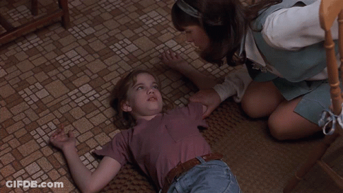 Laying Girl Eyes Closed Watched By Another GIF