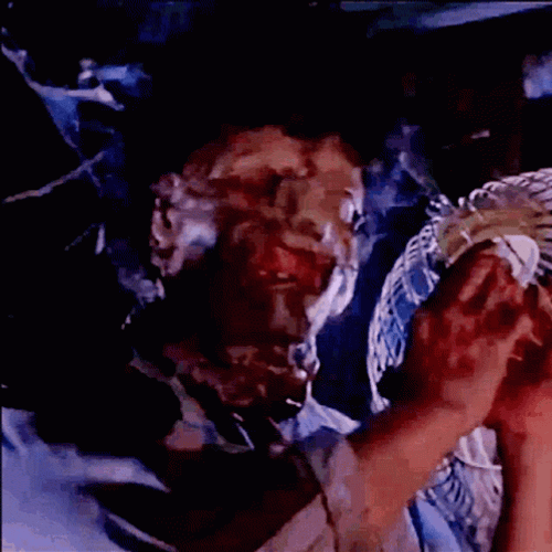 Leatherface Banging Head GIF
