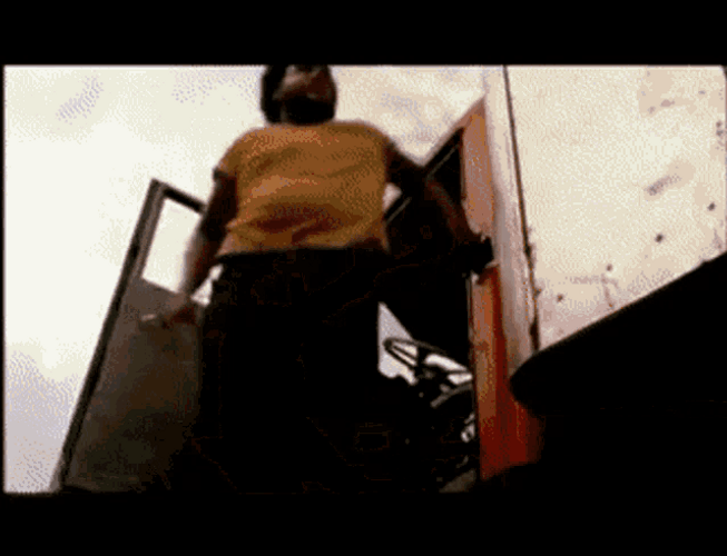 Leatherface Chasing Two People GIF