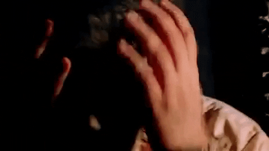 Leatherface Wearing Human Skin Mask GIF