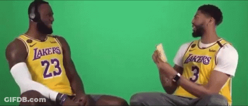 Lebron James And Anthony Davis Are Sitting Next To Each Other On A Green Screen . GIF