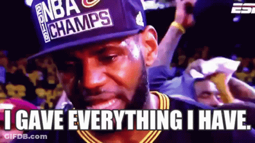 Lebron James Is Wearing A Hat That Says Nba Champs On It . GIF