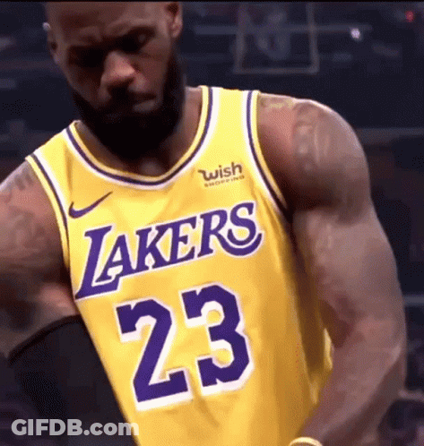 Lebron James Is Wearing A Lakers Jersey With The Number 23 On It . GIF