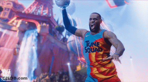 Lebron James Is Wearing A Tune Squad Jersey And Holding A Basketball GIF