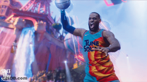Lebron James Is Wearing A Tune Squad Jersey And Holding A Basketball GIF
