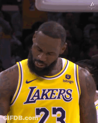 Lebron James Is Wearing A Yellow Lakers Jersey During A Game GIF