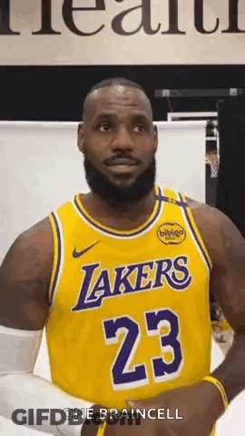 LeBron James Smiling In Yellow Lakers Jersey GIF