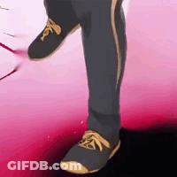 Leg In Black And Yellow Shoes GIF
