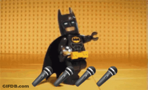 Lego Batman Holding Four Microphones GIF