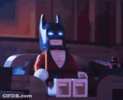 Lego Batman In Tuxedo With Glowing Eyes GIF