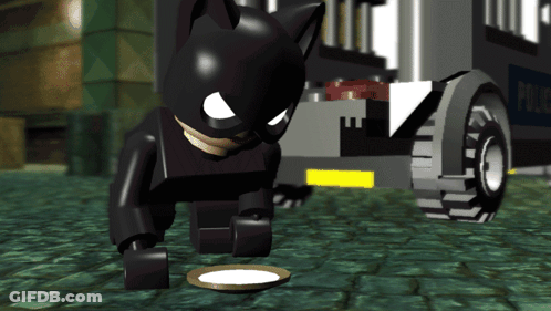 Lego Batman Looking At Food In Front Of Police Car GIF