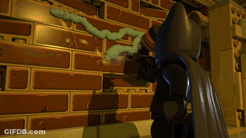 Lego Batman Standing Next To Brick Wall GIF