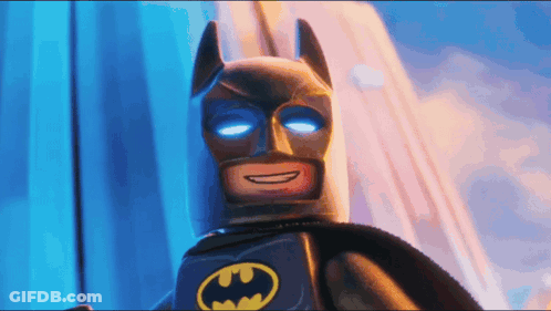 Lego Batman With Blue Eyes Smiling GIF