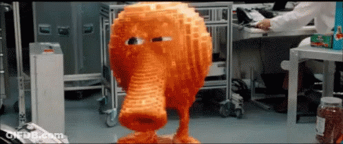 Lego Cartoon Character With Large Nose Standing In Room GIF