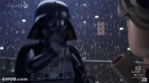 Lego Darth Vader Standing In Front Of Xbox Live Screen GIF