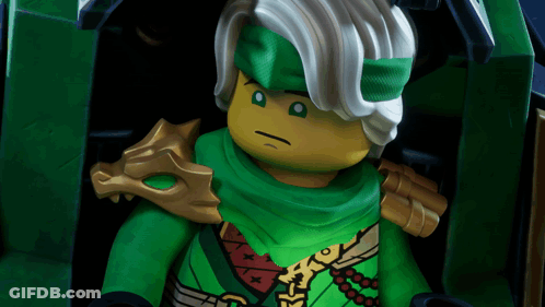 Lego Figure In Green Outfit Close Up GIF