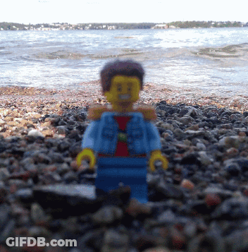 Lego Figure On Rocky Beach GIF
