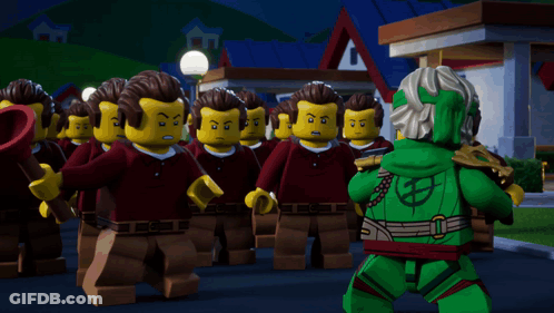 Lego Figures Standing In Front Of Building GIF