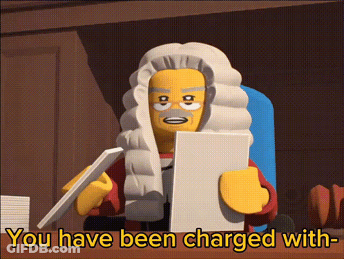 Lego Judge Holding Charge Paper GIF