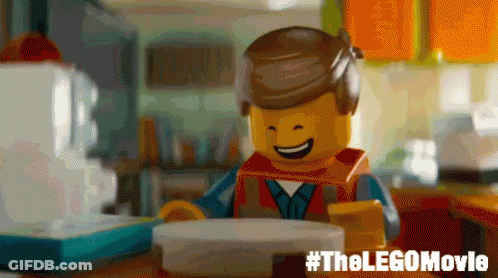 Lego Man Smiling Holding Plastic Container #Thelegomovie GIF