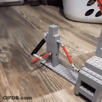 Lego Pieces On Wooden Floor With Basket GIF