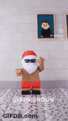 Lego Santa Wearing Sunglasses And Shorts GIF