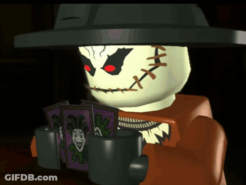 Lego Scarecrow Reading Book Holding Mug GIF