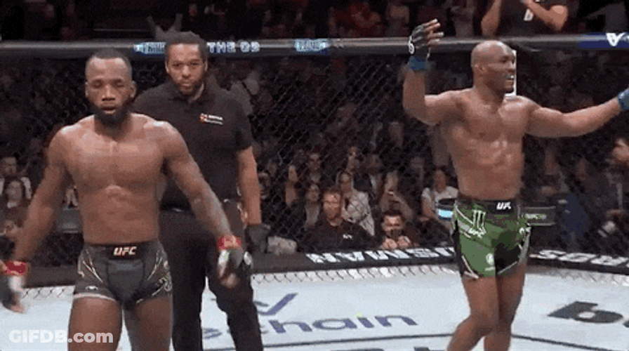 Leon Edwards Arms Up Approaching Camera GIF