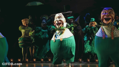 Leprechauns Dancing On Stage GIF