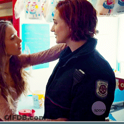 Lesbians Kissing Inside The Arcade GIF