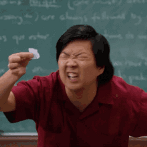 Leslie Chow Really Trying To Read Tiny GIF
