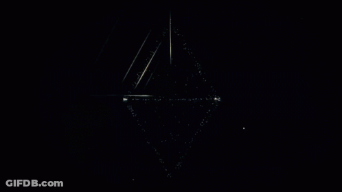 Letter W On Black Background With Stars GIF