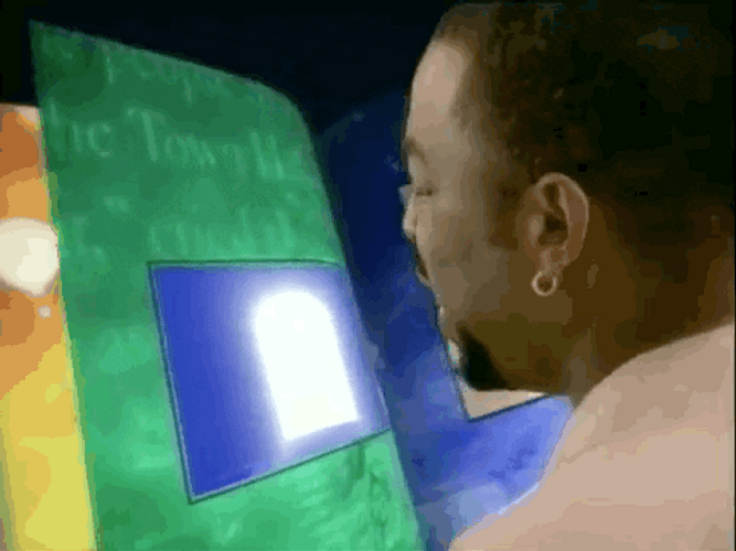 LeVar Burton Reading Rainbow Door On Book GIF