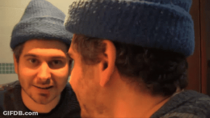 Level Up Man Talking On Reflection GIF