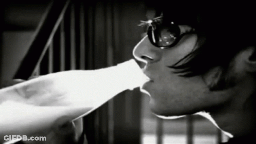 Liam Gallagher Drinking From Bottle GIF