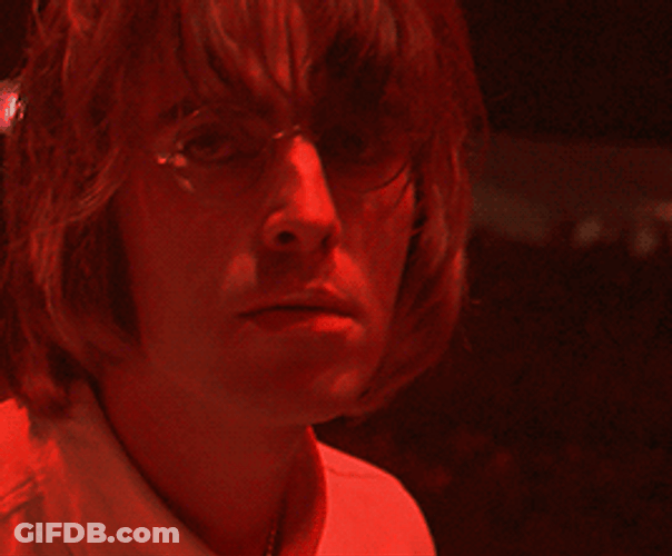 Liam Gallagher With Red Lighting GIF
