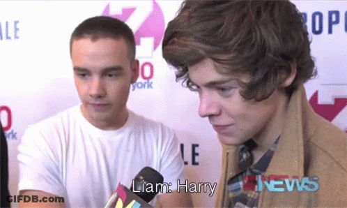 Liam Harry Talking Into Microphone At News GIF